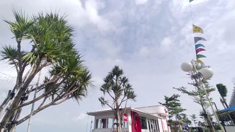 View of the blue sky above at  a culinary spot in North Jakarta Stock Footage 228764281