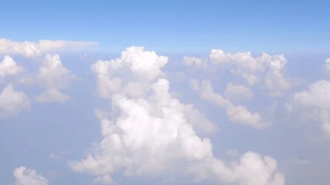 View of the blue sky and clouds from the height of birds eye Stock Footage 74971345