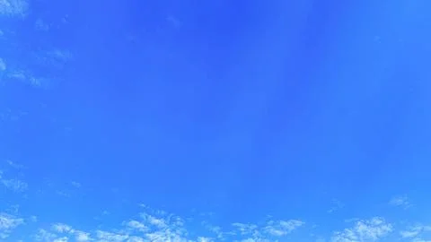 View of blue sky with few clouds Stock Photos