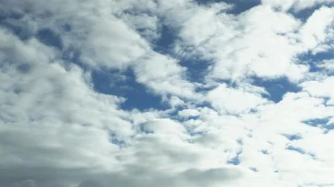 View of a blue sky with some clouds Stock Photos