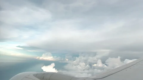 View of blue sky  from windows on the Airplane Stock Footage 140493610