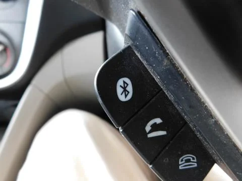 View of Bluetooth device switch of a car Stock Photos