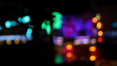 View of blurry blinking lights at carnival faiground at night Stock Footage 120138536