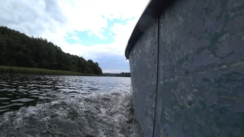 View from the board of a floating iron motor boat Stock Footage 114000759