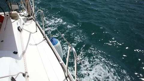 View from the board of the yacht down to the water with foam. Stock Footage 249225828