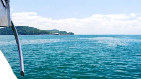 View from boat ariving at Ilha dos Frades pier, Bahia, Brazil Stock Footage 125320442