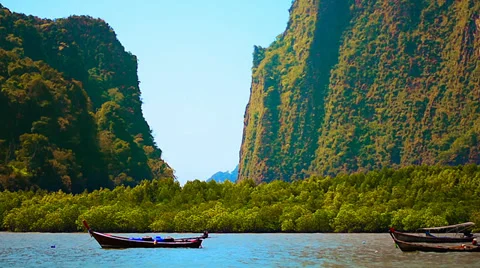 View of the boat between the rocks in the tropical sea Video stock 36446704
