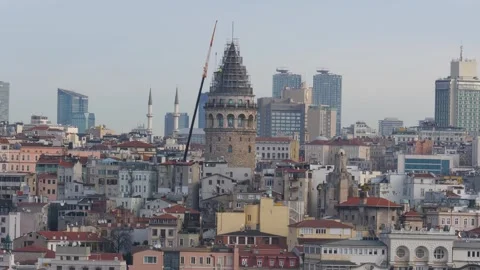 A view from a boat to the famous Galata tower in Istanbul and the surroundings Stock Footage 265485994