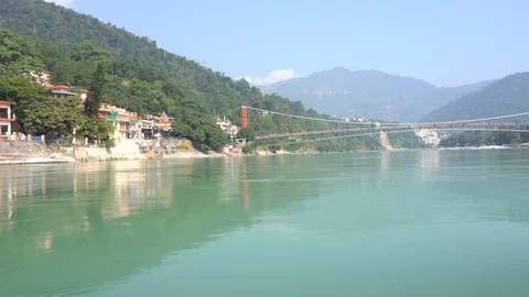 View from the boat that floats on the river Ganges, Rishikesh, India Stock Footage 100571307