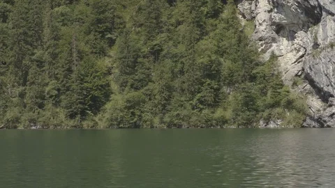 View from the boat on the green rocks Stock Footage 83733931