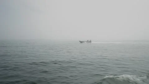 View from a boat of an inflatable dinghy navigating in the Atlantic Ocean Video stock 283683040