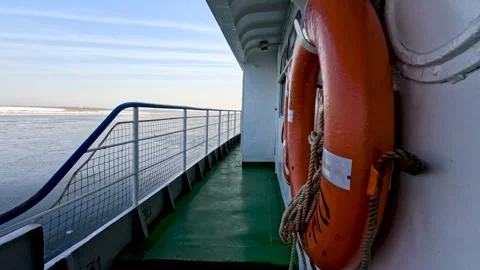 View of a boat moving on a winter river Stock Footage 306548235