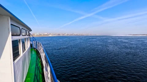 View of a boat moving on a winter river Stock Footage 321612315