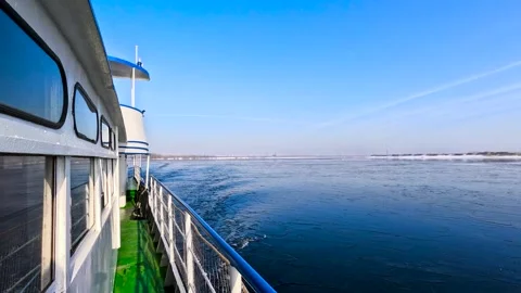 View of a boat moving on a winter river Stock-Footage 331207071