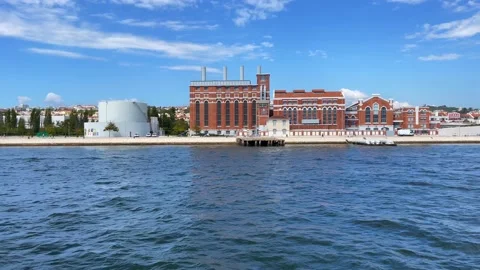 View from a boat over Tejo power station beside MAAT Museum in Lisbon, Portugal Stock Footage 223350385