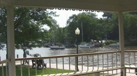 View of Boat Passing from Charming Gazebo Stock Footage 11106317