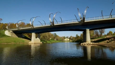 View from a Boat Passing Under a Beautiful Bridge with Arches on the River. Stock Footage 306401688