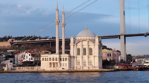 View from boat trip on Bosphorus bridge and the mosque Ortaky with blue dome Stock Footage 243615593