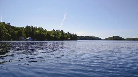 The view from a boat while cruising on Lake Joseph, Ontario. 스톡 동영상 96524640