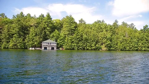 The view from a boat while cruising on Lake Joseph, Ontario. Stock Footage 96529525
