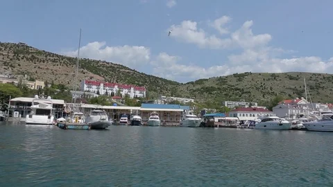 View from the boat on yahts in small sea city 스톡 동영상 76247317