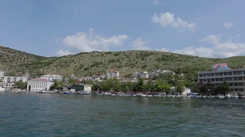 View from the boat on yahts in small sea city Stock Footage 76247403