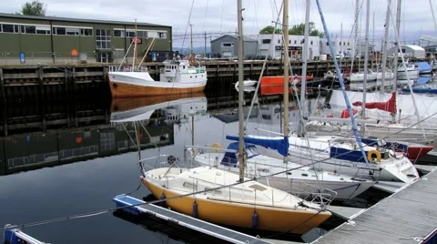 View to the boats tied at the harbor in Trondheim, Norway. Stock Footage 59651353
