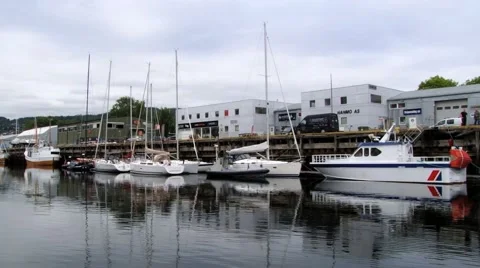 View to the boats tied at the harbor in Trondheim, Norway. Video stock 59659306