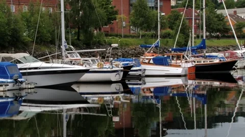 View to the boats tied at the harbor in Trondheim, Norway. Stock Footage 59661136