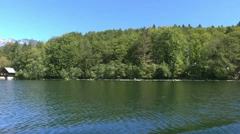 View on the Bohinj lake surrounding area from sailing boat Stock Footage