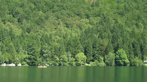 View on the Bohinj lake surrounding area from sailing boat Stock Footage