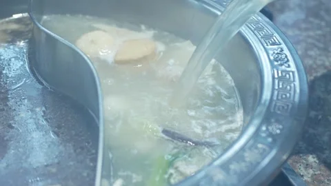 View of boiling hot pot tasty with spicy soup shabu shabu in chinese style .. Stock Footage 256377744