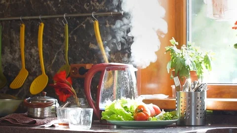 View of the boiling kettle in a beautiful kitchen. Stock Footage 80274107