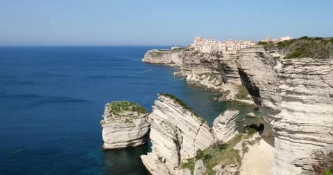 View of Bonifacio town and the limestone cliff in Corsica, France Stock Footage 195038910