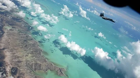 View from boom operators window of U.S. F-15C Eagle in flight over Caribbean Sea Vídeo Stock 201526705