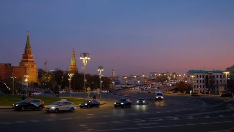 View of Borovitskaya Square, the Big Stone Bridge and the Kremlin in the evening Stock Footage 120600008