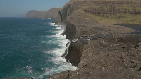 View Of Bosdalafossur Waterfall With Geitaskoradrangur Sea Stack At The Stock Footage 194133061