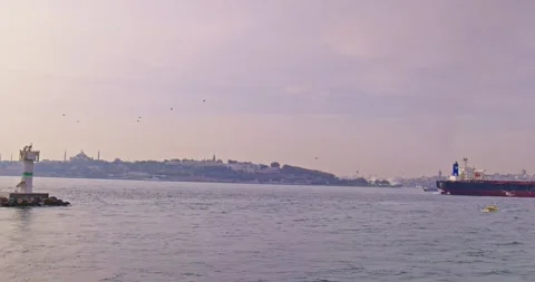 View of the Bosphorus at red sunset and ships going on the sea Stock Footage 260813018