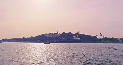 View of the Bosphorus at red sunset and ships going on the sea. Stock Footage 260813688