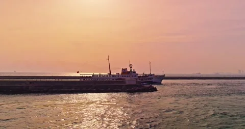 View of the Bosphorus at red sunset and ships going on the sea Stock Footage 260818898