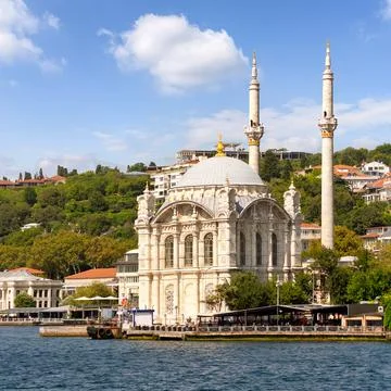 View from Bosphorus Strait overlooking Ortakoy Mosque, or Ortakoy Camii, suited Stock Photos