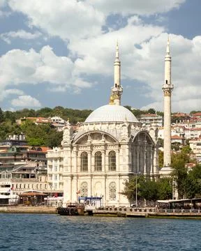 View from Bosphorus Strait overlooking Ortakoy Mosque, or Ortakoy Camii, suited Stock Photos