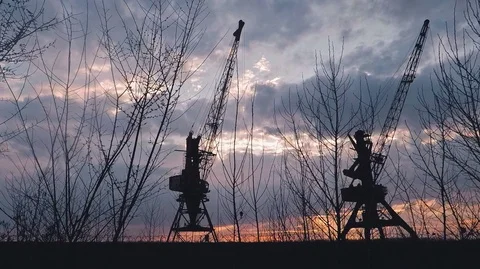 View from the bottom angle on the large cranes in the cargo port Stock Footage 125931084