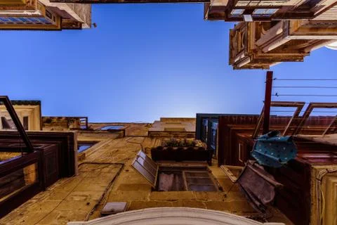View from the bottom between the buildings in Malta Stock Photos