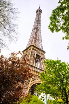 View from the bottom of The Eiffel Tower in Paris in cloudy day, France Foto stock