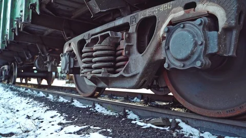 View of bottom to movement of powerful wheel mechanism of a freight car Stock Footage 104082034