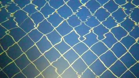 View of the bottom of the pool through water surface Stock Footage 310281512