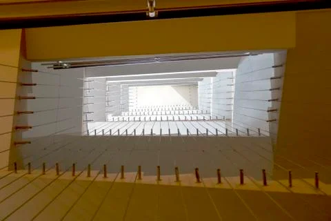 View from the bottom of a rectangular staircase in hotel Stock Photos