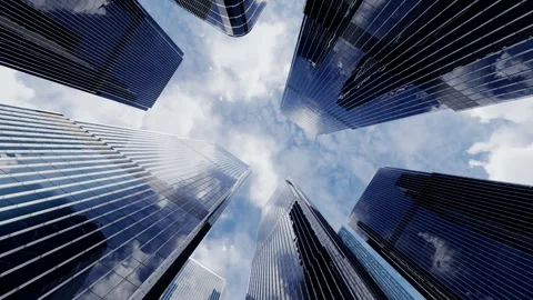 View from bottom to top of skyscrapers with clouds floating above them. Stock Footage 299567477