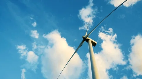View up, bottom view of a wind turbine, windmill isolated on blue sky background Stock Footage 108862960